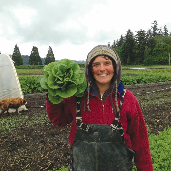 Woman holding lettuce